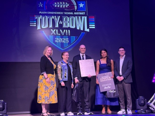 Thomas Rooklidge receiving the Teacher of the Year 2025