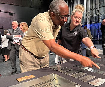  Travis Smith former Williams HS Band Director now retired views donor plaque