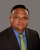 Portrait of Dr. Dash Weerasinghe, Senior Executive Director for Assessment, Research and Program Evaluation