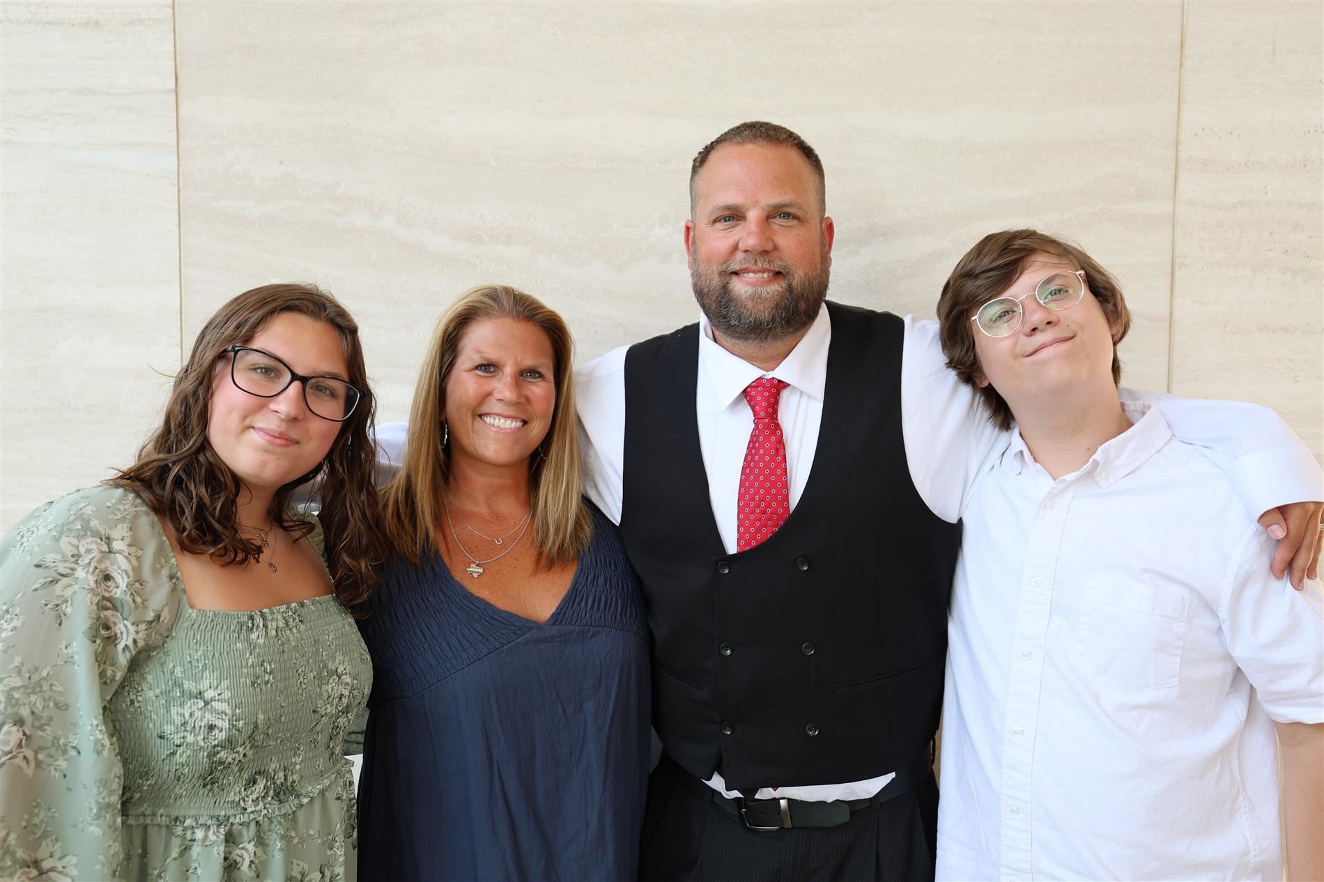 Travis Ragsdale (second right) pictured with his family