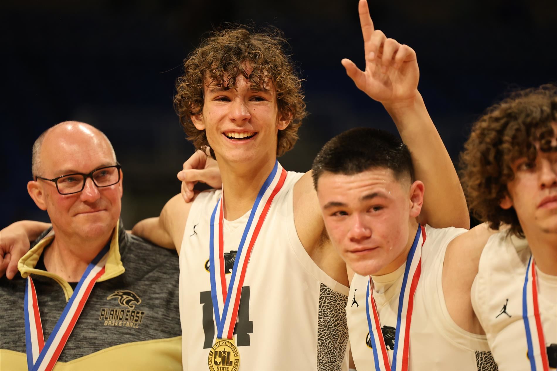 Image of Panther Basketball Coach, Center Seth Romero and Narit Chotikavanic 