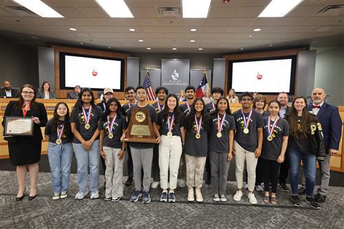 Plano East Robotics team with Board Vice President Dr.Lauren Tyra