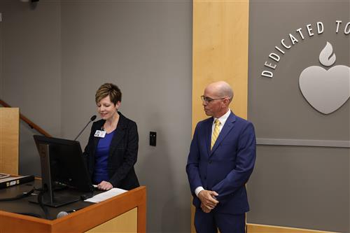 Dr. Joy Lovell and Dr. Mark Letterer addressing the board as well as assistant principals tuning in virtually