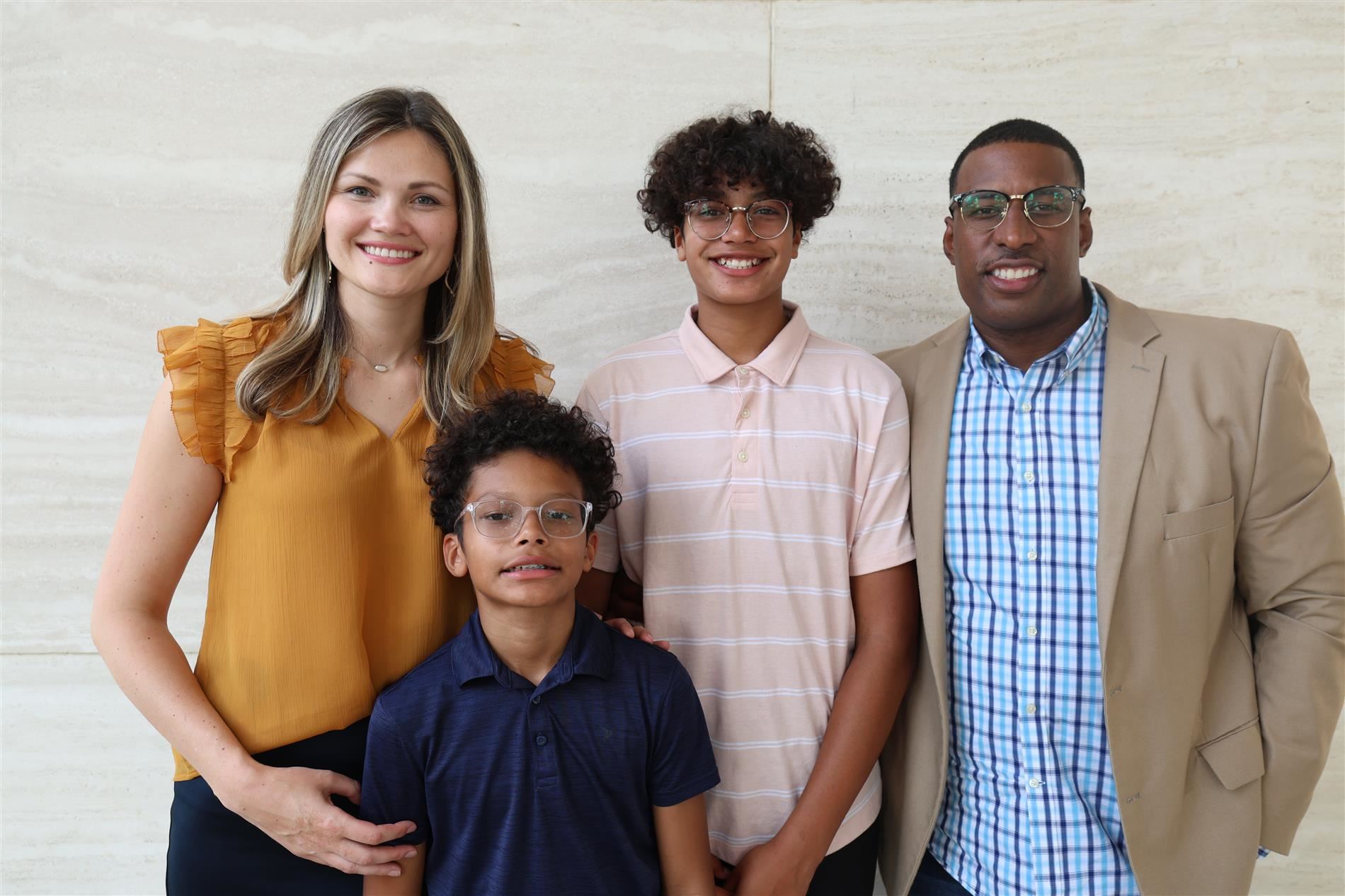 Lasma Jekabsone-Berrouet with her husband and two children