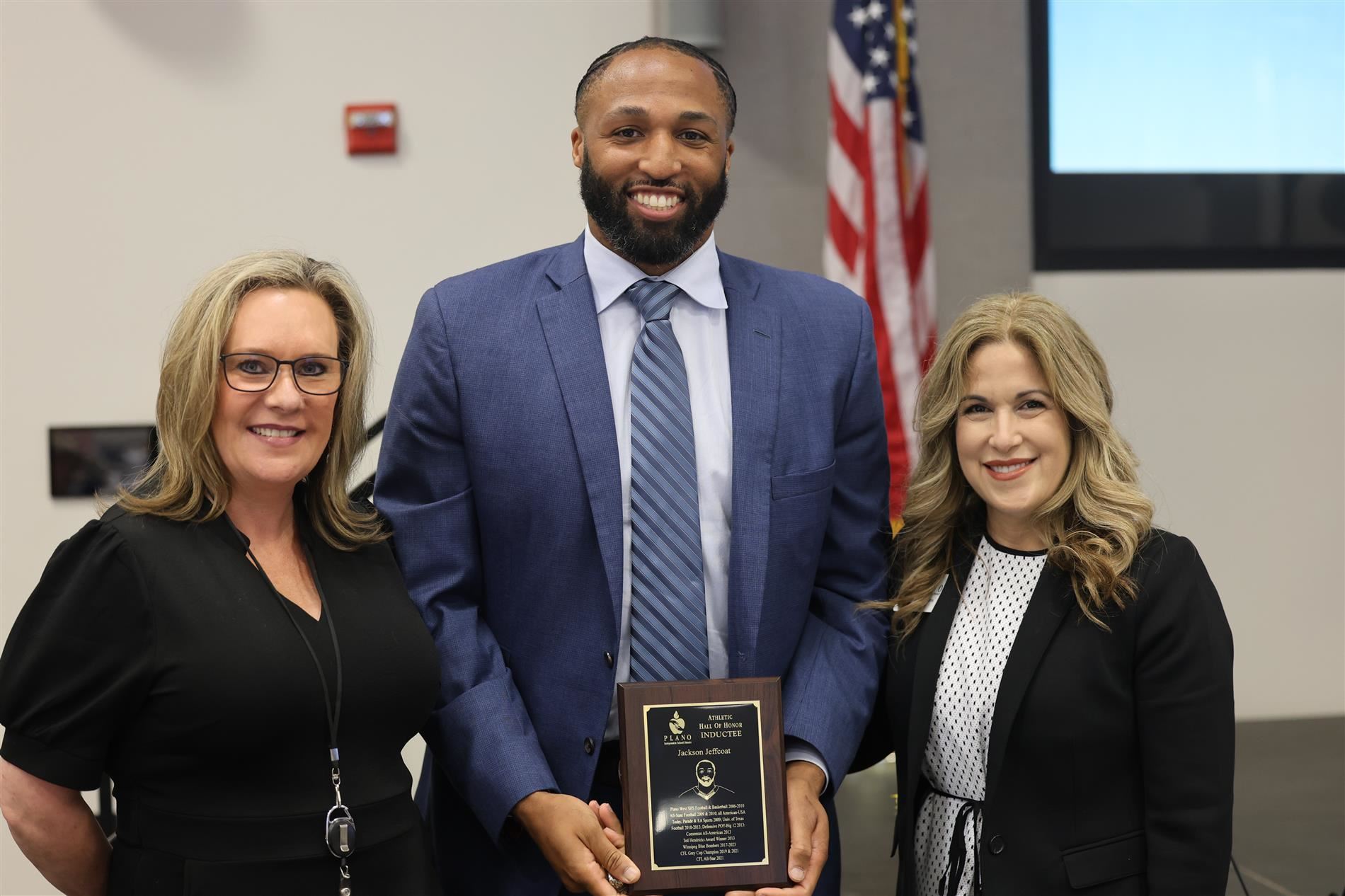 Image of Deputy Superintendent Dr. Selenda Freeman, Jackson Jeffcoat and Superintendent Dr. Theresa Williams