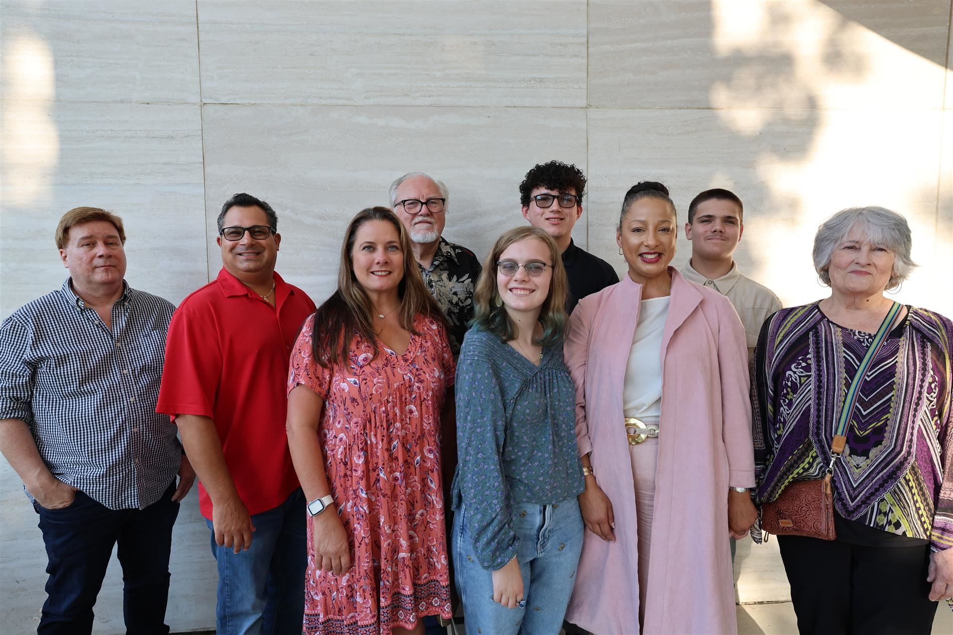 Tara Lane (front right) pictured with family at the August 2024 board meeting
