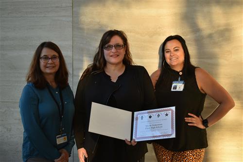 Nicole Vickerman posing with Principal Pamela Clark and colleague Alexis Wilkinson