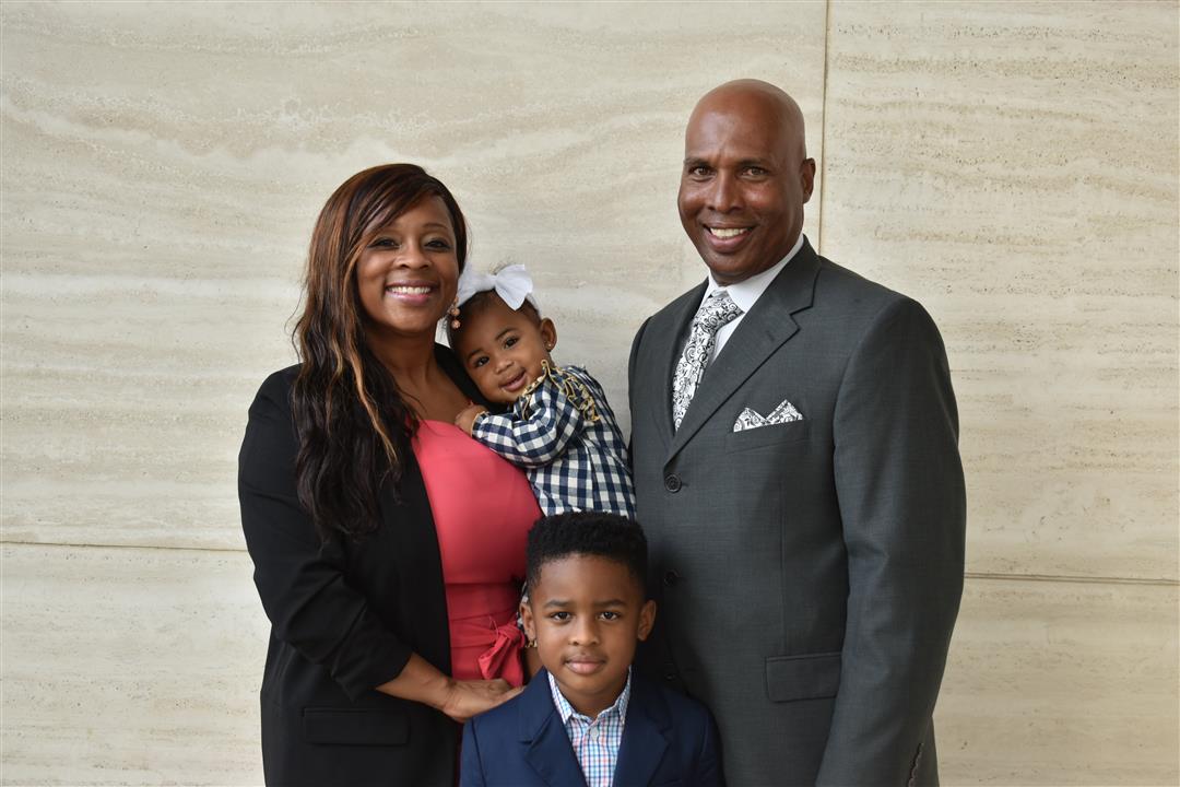 Gwendolyn Johnston poses with her husband and two children