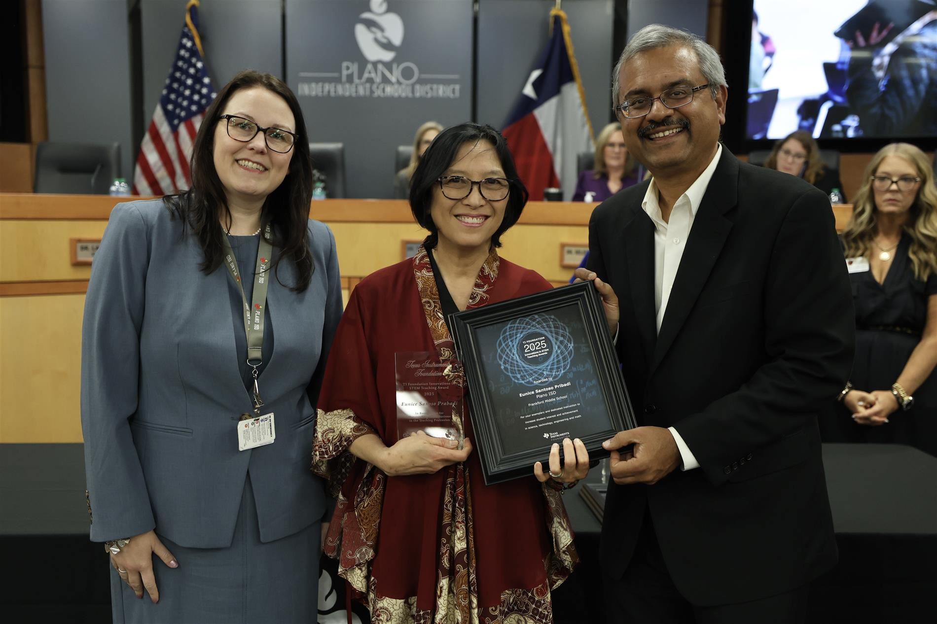 Eunice with Board President Dr. Lauren Tyra and Harshal Chhaya