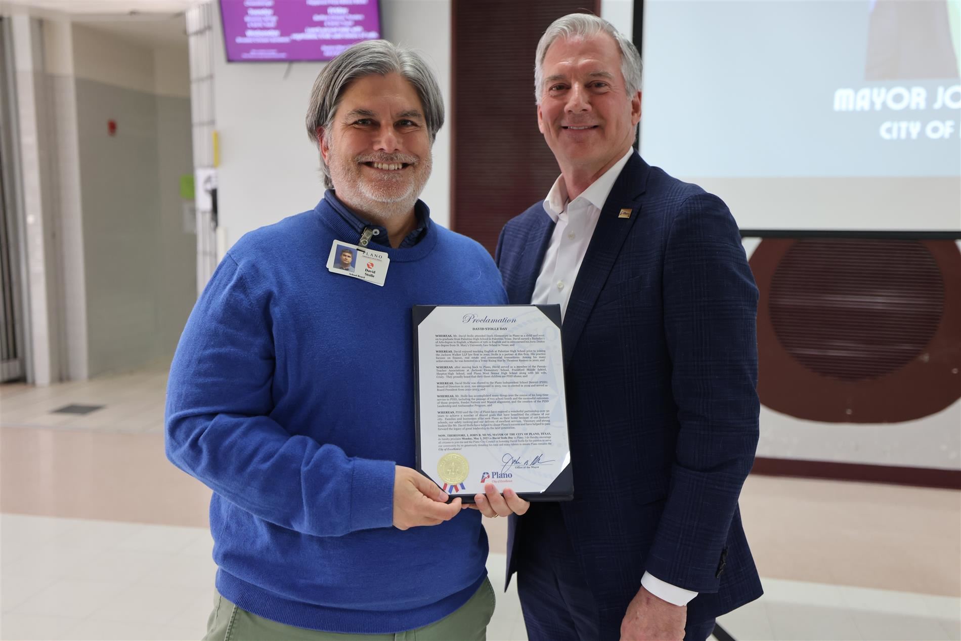 President Stolle and Plano Mayor John Muns with proclamation