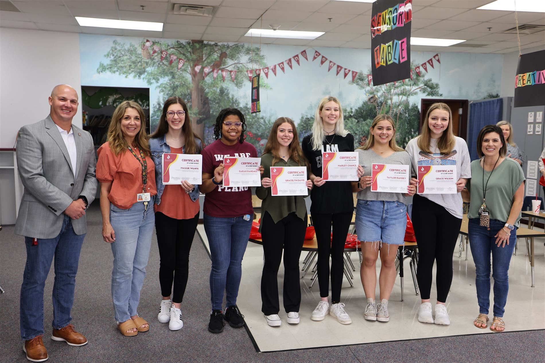 image of pshs students with campus principal and teacher