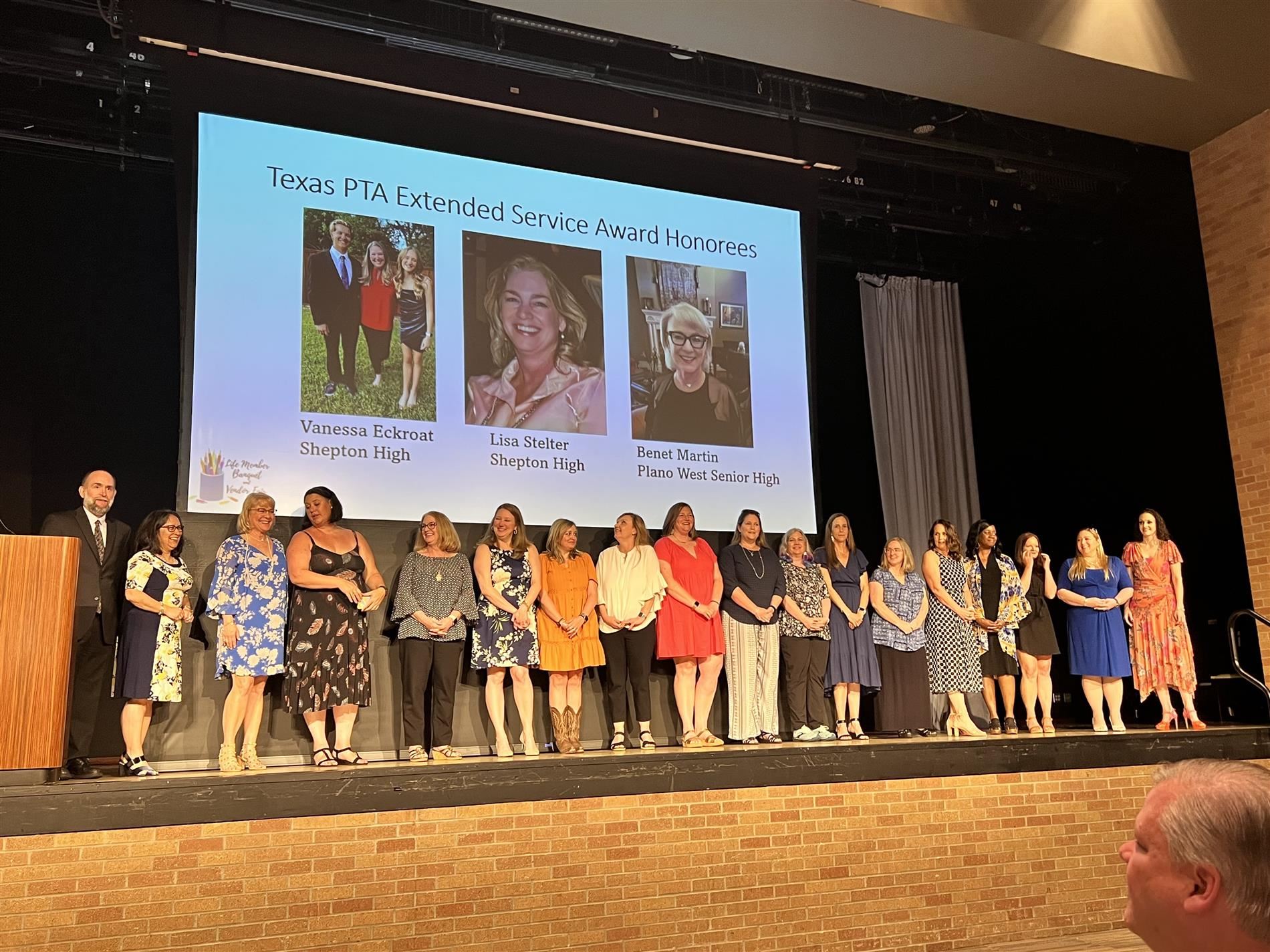  group of pta members on stage