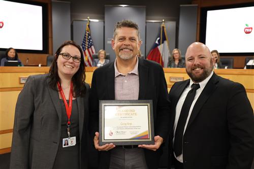 Board Vice President Dr. Lauren Tyra with Greg Arp and Dr. Phillip Morgan