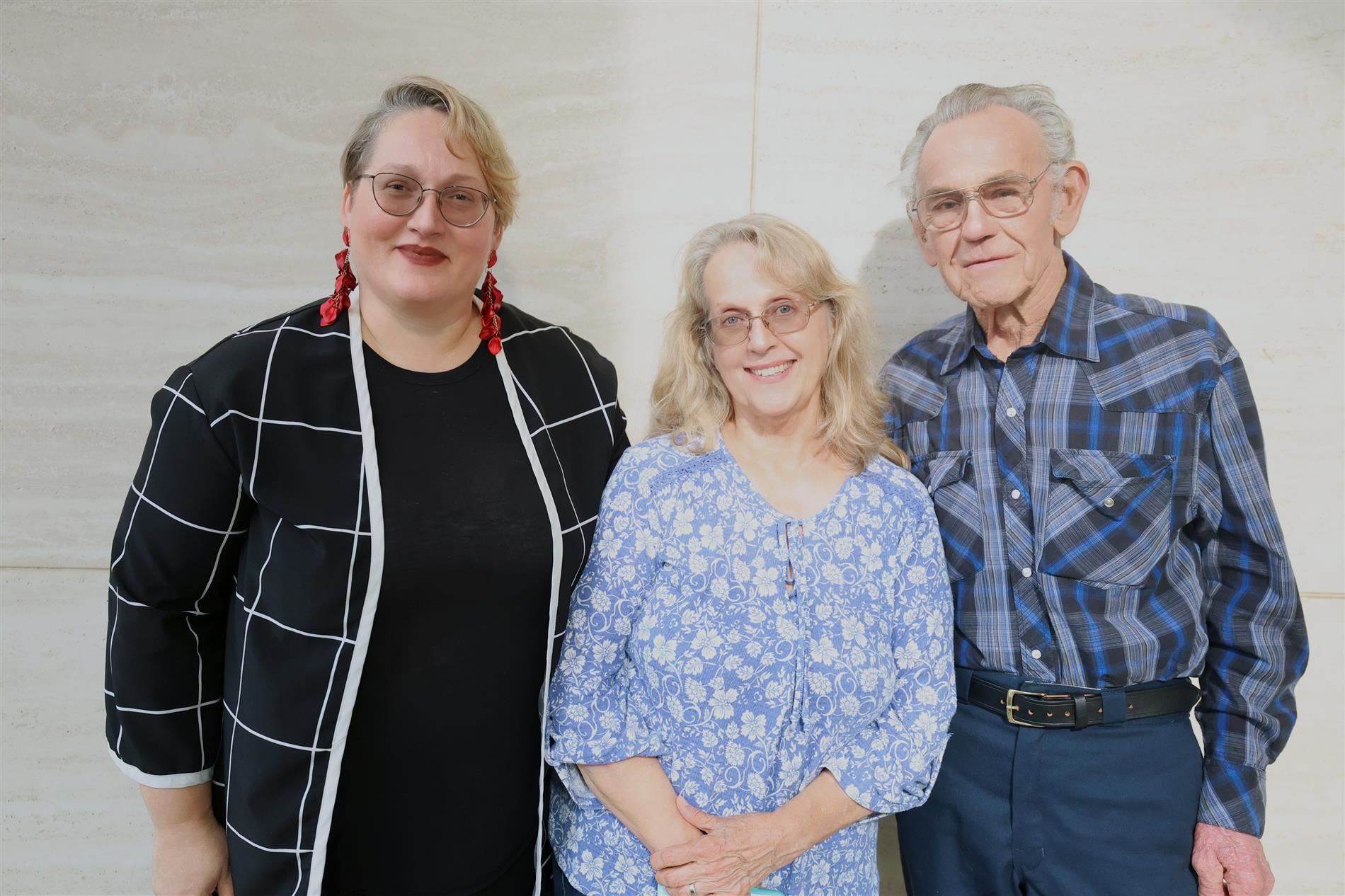 Kimberly Schrader with her parents