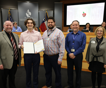 Nicolo Bosseli receiving recognition at the March board meeting.