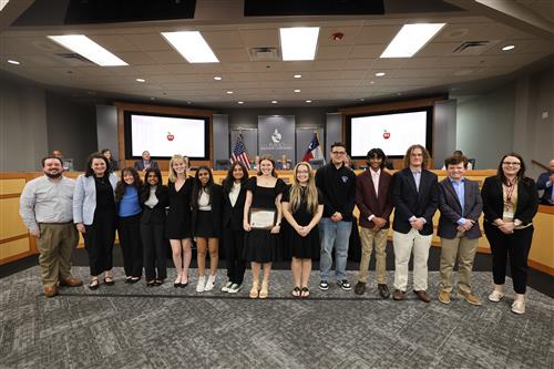 Plano West Senior High School Chorale with Board Vice President Dr. Lauren Tyra