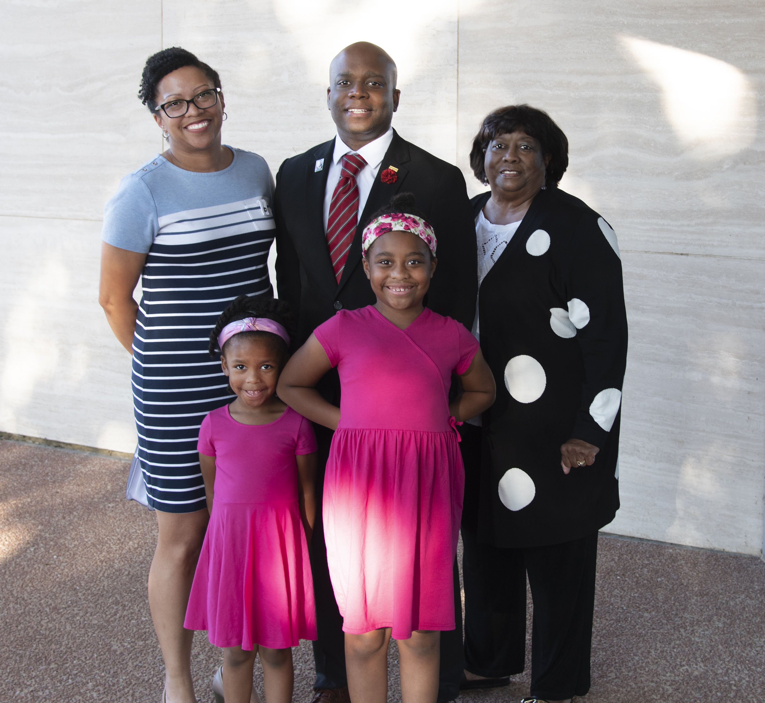 Chad Stoker with his wife, their 2 daughters and his mother