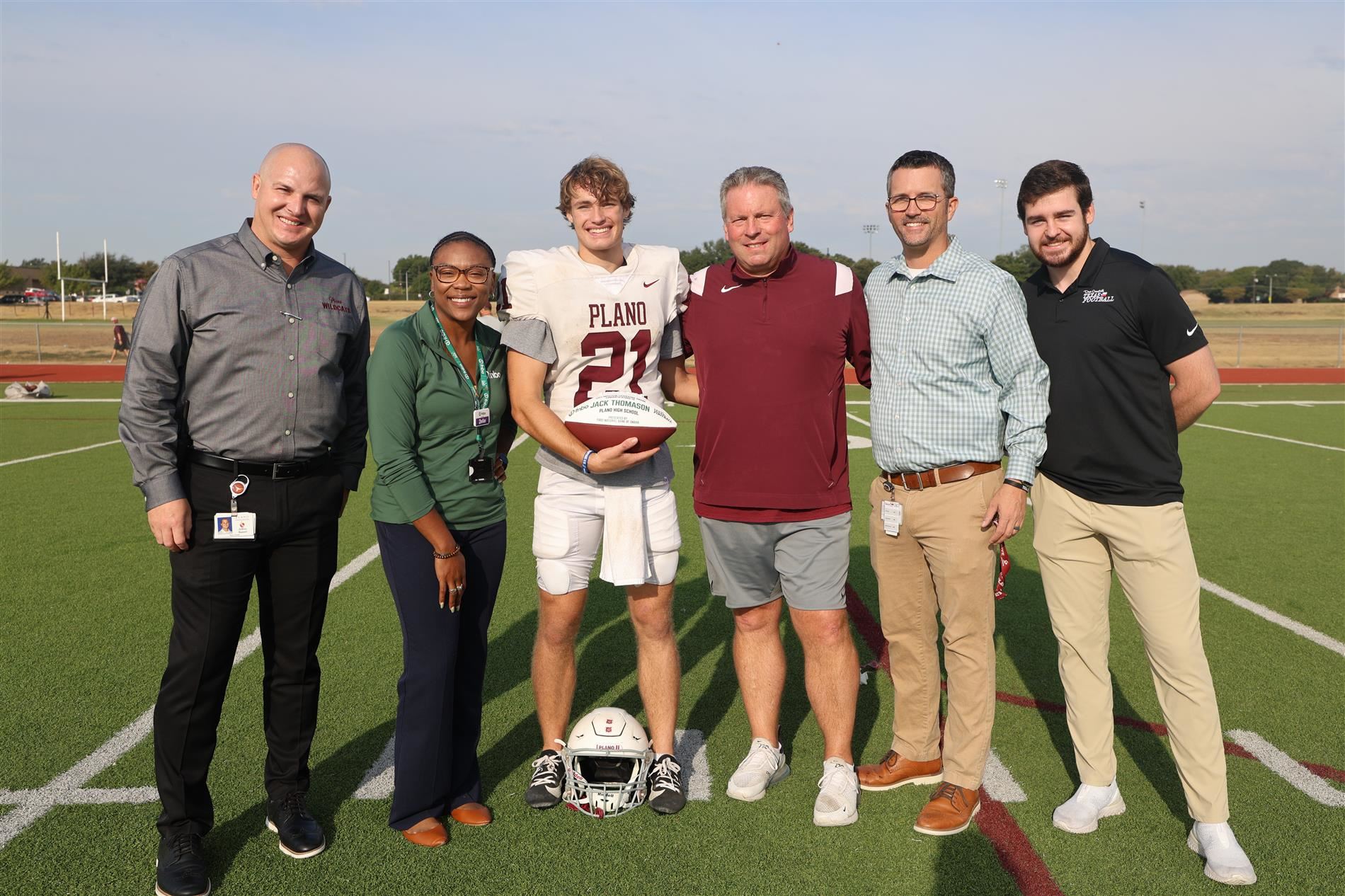 image of jack thomason with plano senior high administrators, dave campbells rep and sponsor rep