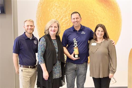 Rice MS Principal Chris Glasscock receiving NTFB Peanut Butter Drive Award 