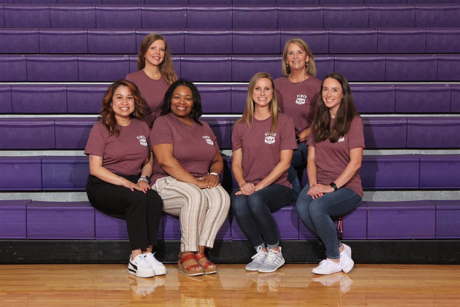 Group photo of the counseling department including the registrar, school social worker, academic specialist, and counselors