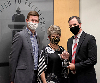 CFO Randy McDowell with Michael Steffan Equitable (award sponsor) & Tracy Ginsburg TASBO