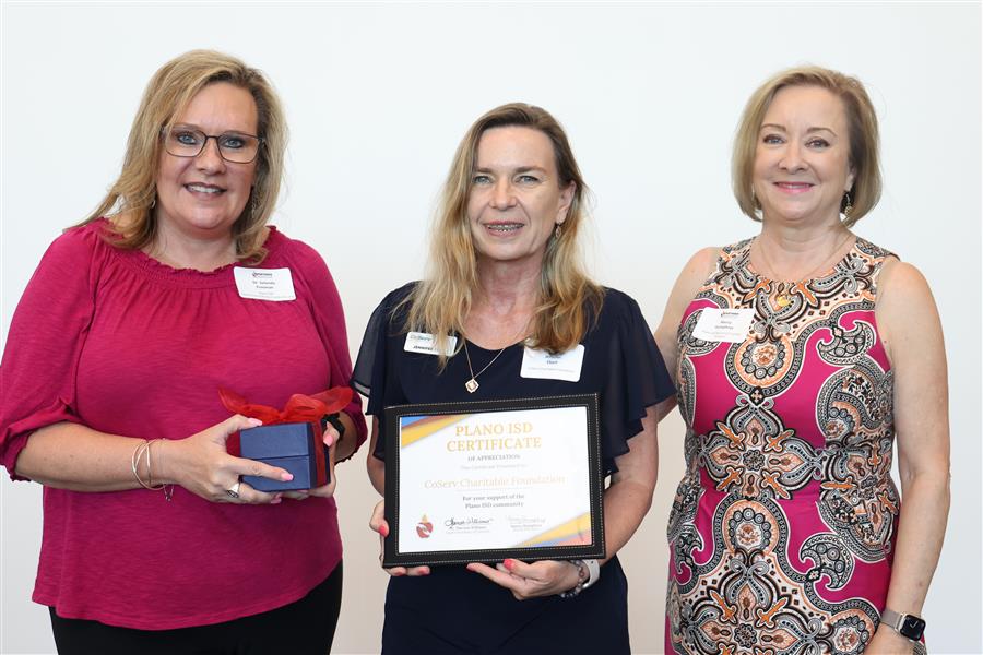 CoServ Charitable Foundation rep with certificate and gift box