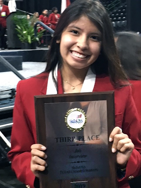 Jennifer Chavira Bronze winner with plaque