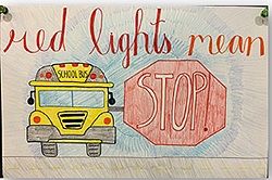 bus poster art: red lights mean STOP